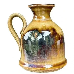 MCM signed Olson luster glazed earthenware bottle candle holder with handle